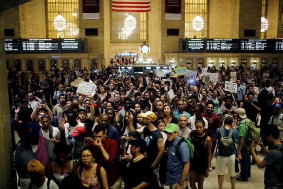 Thousands take to streets in US cities to denounce fatal shooting of black men